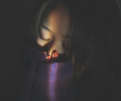 Woman covering her face in emotional distress, representing depression as a Christian and seeking hope